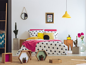 Mexican Fiesta Kids Bedroom with polka dot bed covers and colourful decorations and lamp and plants